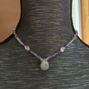 Energy Muse necklace with amethyst. Excellent condition.